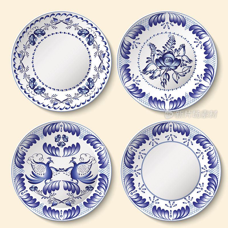 Set of decorative porcelain plates with blue national pattern in Gzhel style.